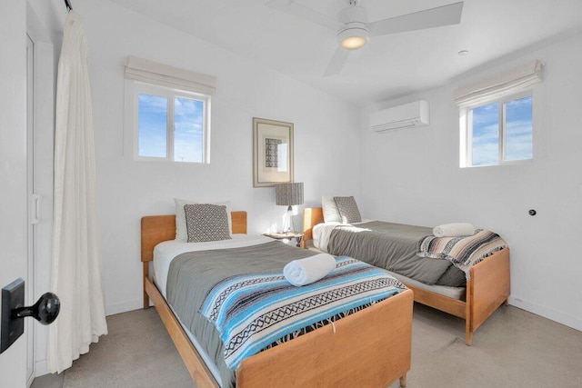 carpeted bedroom with a wall mounted air conditioner, ceiling fan, and multiple windows