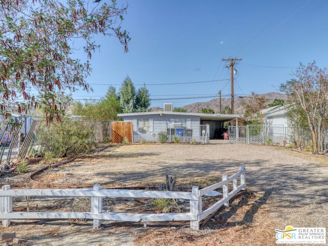 view of front of house with a carport