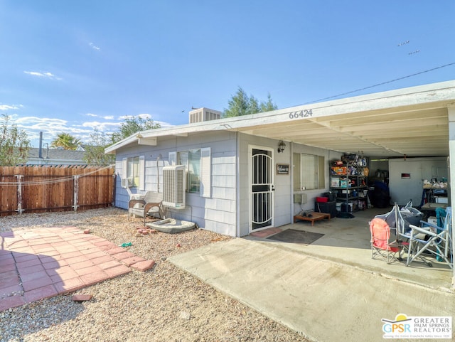 exterior space featuring a carport