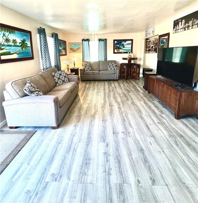 living room featuring light wood-type flooring