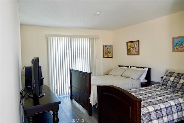 bedroom with wood-type flooring