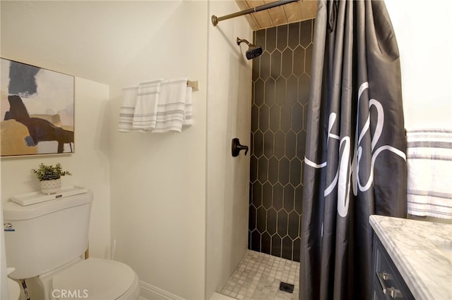 bathroom with toilet, vanity, and a shower with shower curtain