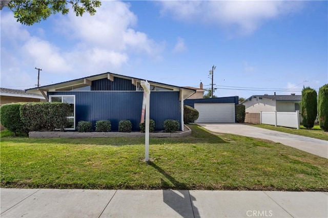 ranch-style house with a garage, an outbuilding, and a front yard