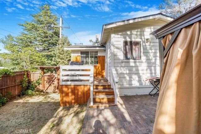 back of house with a patio area