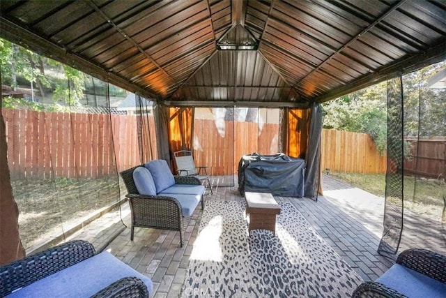 view of patio with outdoor lounge area, a gazebo, and a grill