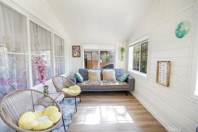 sunroom / solarium with lofted ceiling