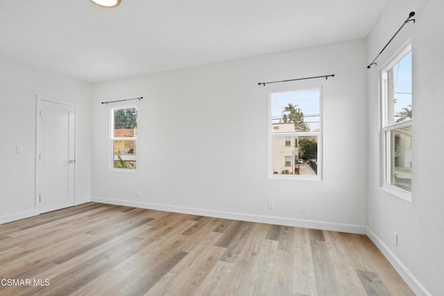 empty room featuring light hardwood / wood-style floors