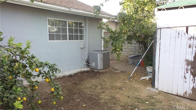 view of home's exterior with cooling unit