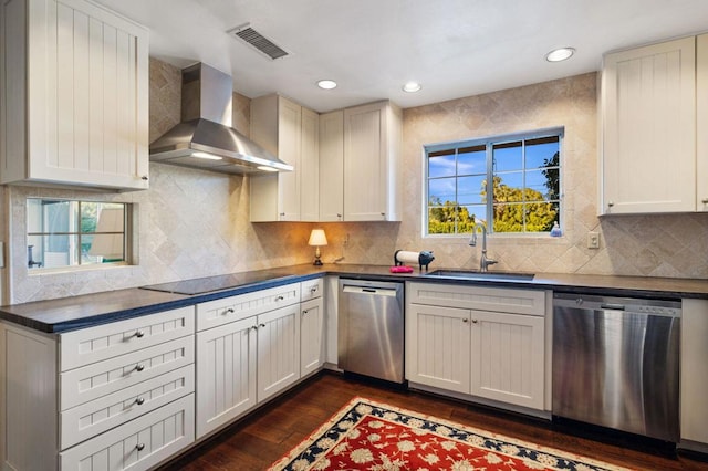 kitchen with dishwasher, wall chimney exhaust hood, dark hardwood / wood-style floors, and black electric stovetop