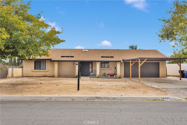 ranch-style house featuring a garage