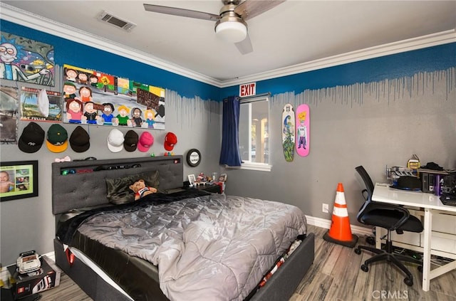 bedroom with wood-type flooring, ceiling fan, and crown molding