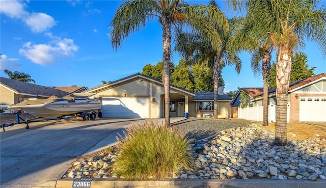 ranch-style home with a garage