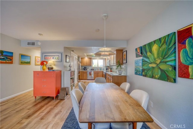 dining area featuring light hardwood / wood-style flooring