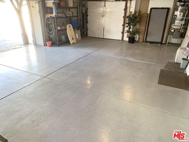 garage featuring heating unit