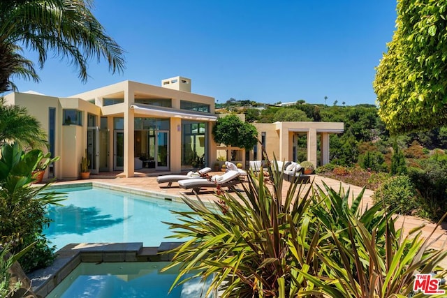 view of pool with a patio