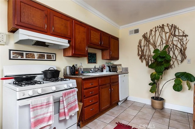 kitchen featuring light tile patterned flooring, white appliances, sink, and ornamental molding