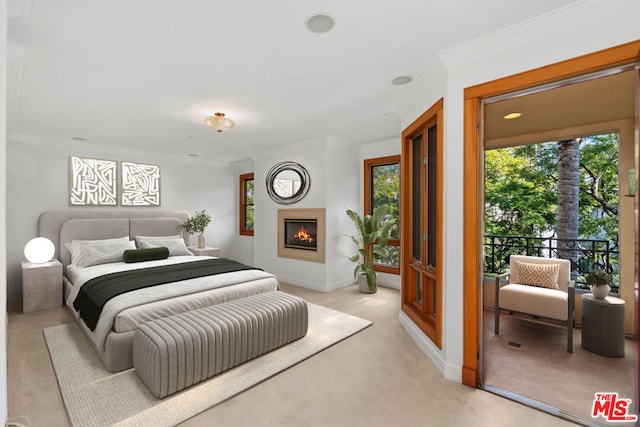 bedroom featuring crown molding and light colored carpet