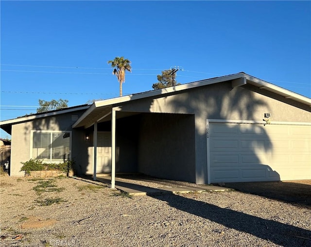 view of home's exterior with a garage