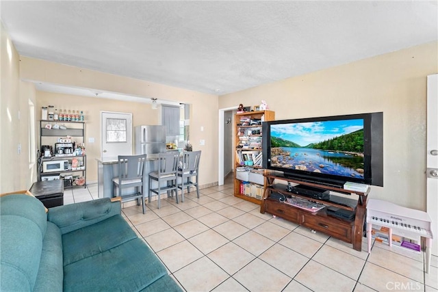 living room featuring light tile patterned floors