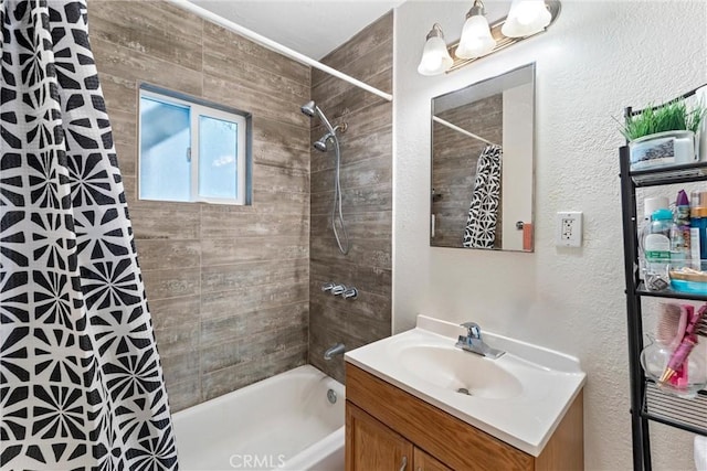 bathroom featuring vanity and shower / bath combo with shower curtain