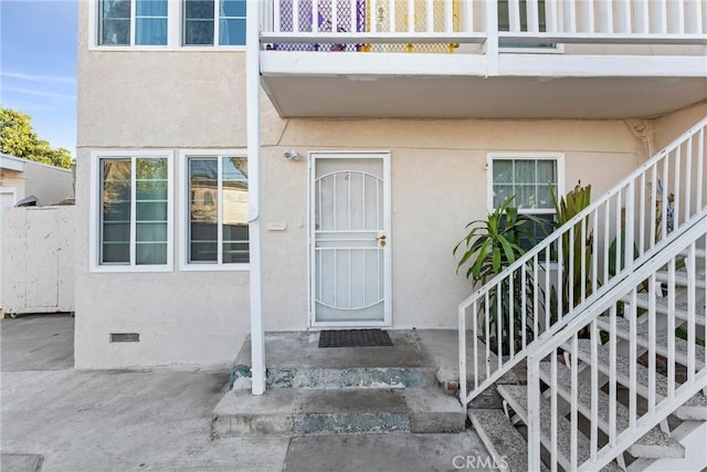 doorway to property with a balcony