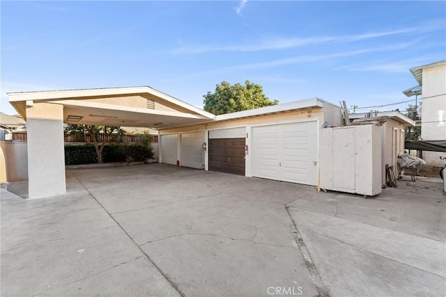 garage with a carport