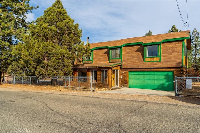 view of front of property featuring a garage