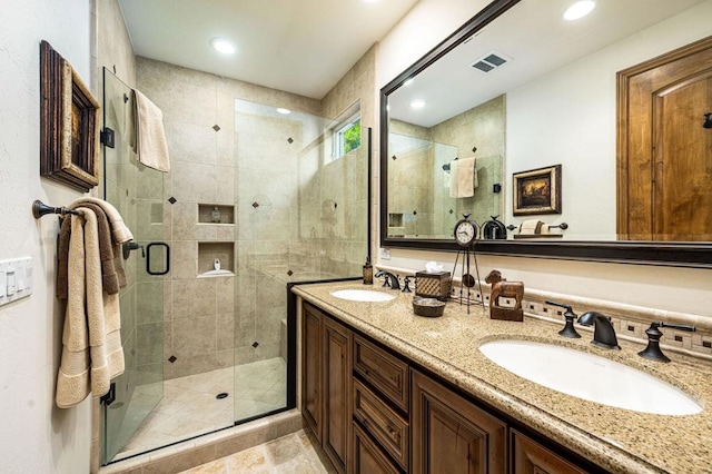 bathroom with vanity and walk in shower