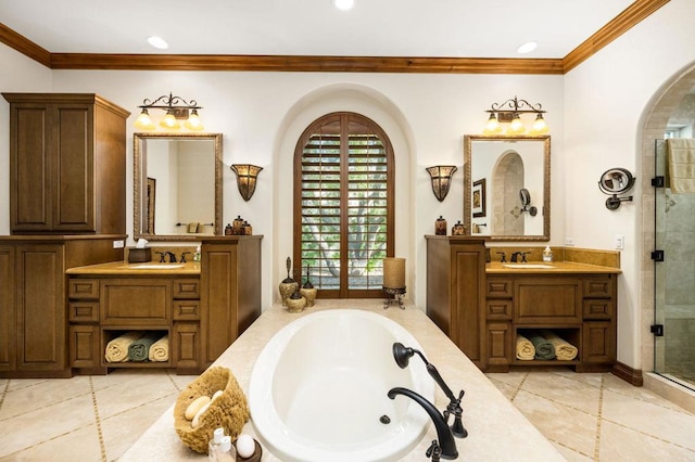 bathroom featuring tile patterned flooring, vanity, ornamental molding, and independent shower and bath