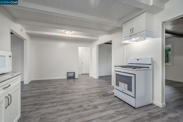 kitchen with beamed ceiling, white appliances, light hardwood / wood-style flooring, and white cabinetry