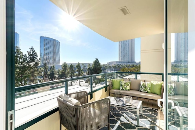 balcony with an outdoor hangout area