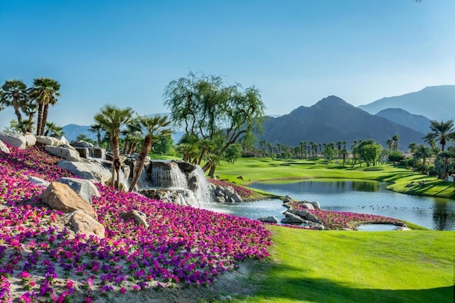 view of property's community with a water and mountain view