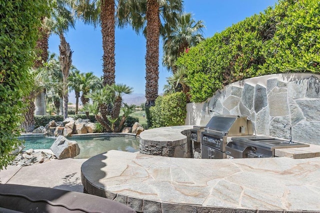 view of patio featuring a grill and area for grilling