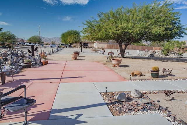 surrounding community featuring a mountain view