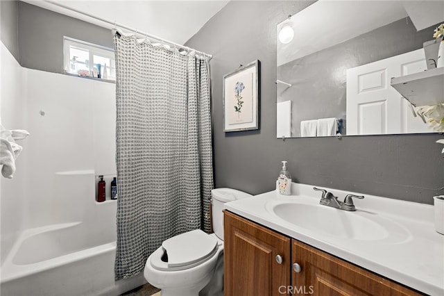 full bathroom featuring vanity, shower / bath combination with curtain, and toilet