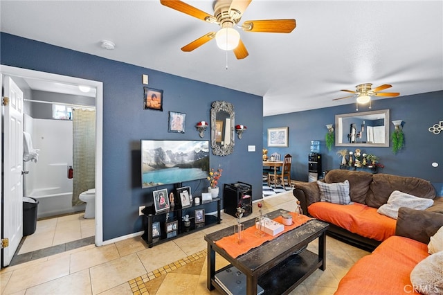 tiled living room with ceiling fan