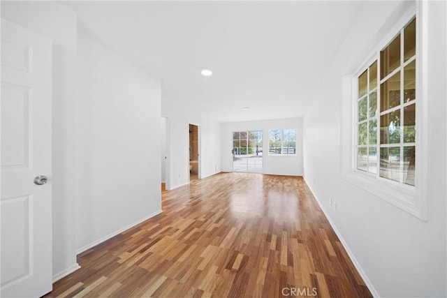 unfurnished living room featuring light hardwood / wood-style flooring