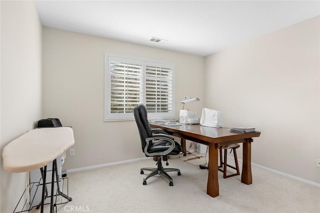 view of carpeted office space