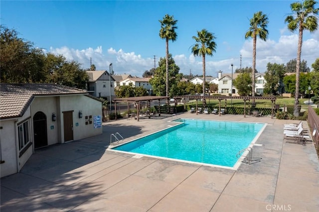 view of pool featuring a patio area