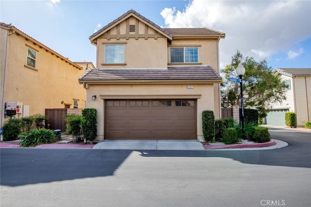 view of front of property featuring a garage