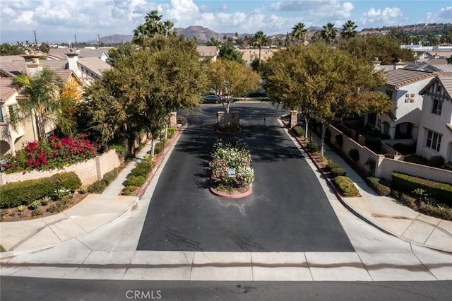 birds eye view of property with a mountain view