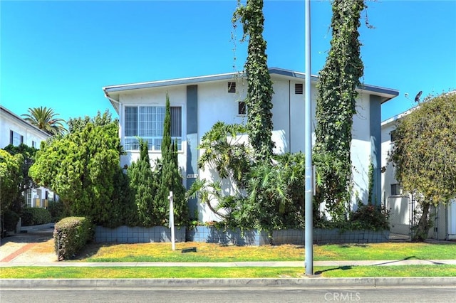 view of home's exterior with a yard