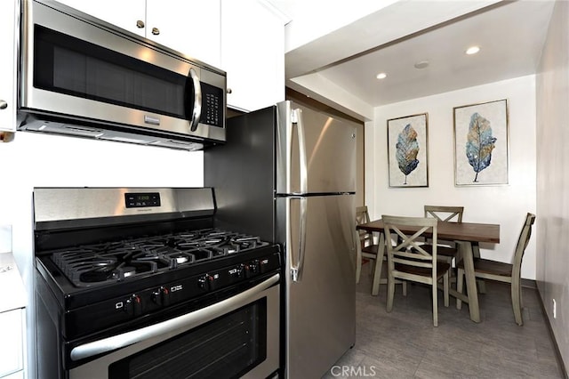 kitchen with white cabinets and stainless steel appliances