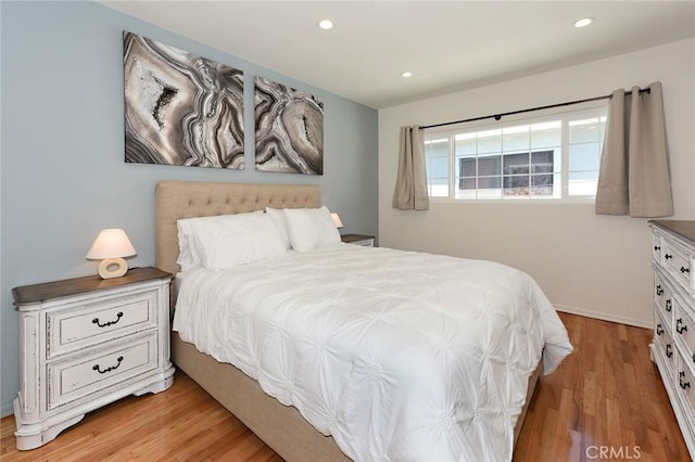 bedroom featuring light wood-type flooring