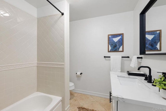 full bathroom with toilet, tile patterned flooring, tiled shower / bath, and vanity