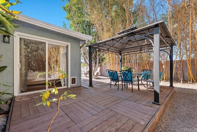 wooden deck featuring a gazebo