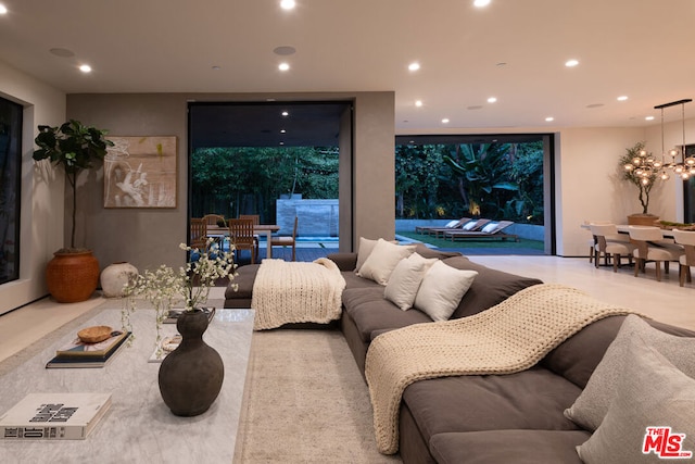 living room featuring a chandelier