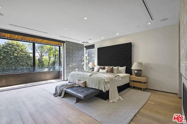 bedroom featuring light hardwood / wood-style flooring