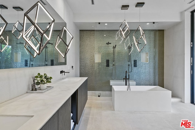 bathroom featuring vanity, concrete floors, tile walls, and independent shower and bath