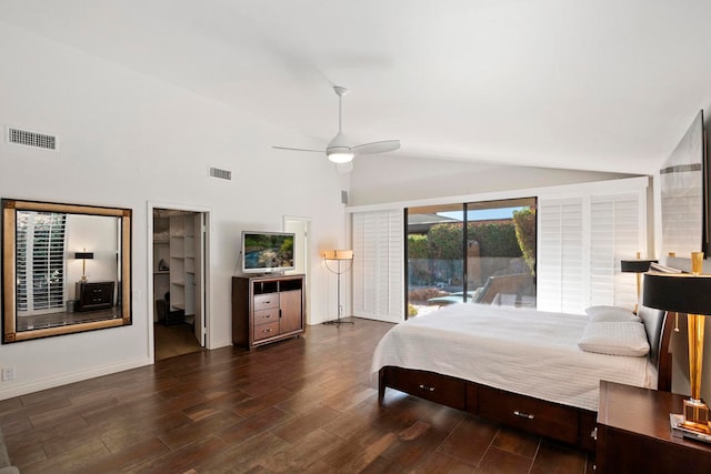 bedroom with a spacious closet, ceiling fan, dark hardwood / wood-style flooring, high vaulted ceiling, and a closet